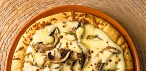 Pizza Bianca With Mushrooms, Fontina, And Rosemary