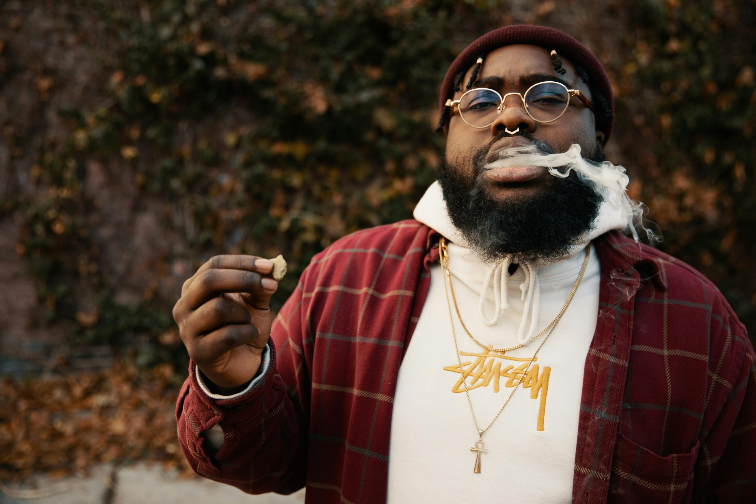 Man smokes cannabis hash