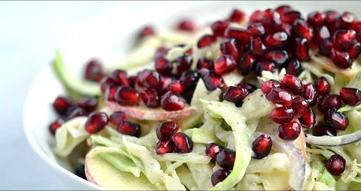 Cabbage, Apple & Pomegranate Hemp Salad with Ginger-Almond Dressing