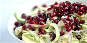 Cabbage, Apple & Pomegranate Hemp Salad with Ginger-Almond Dressing