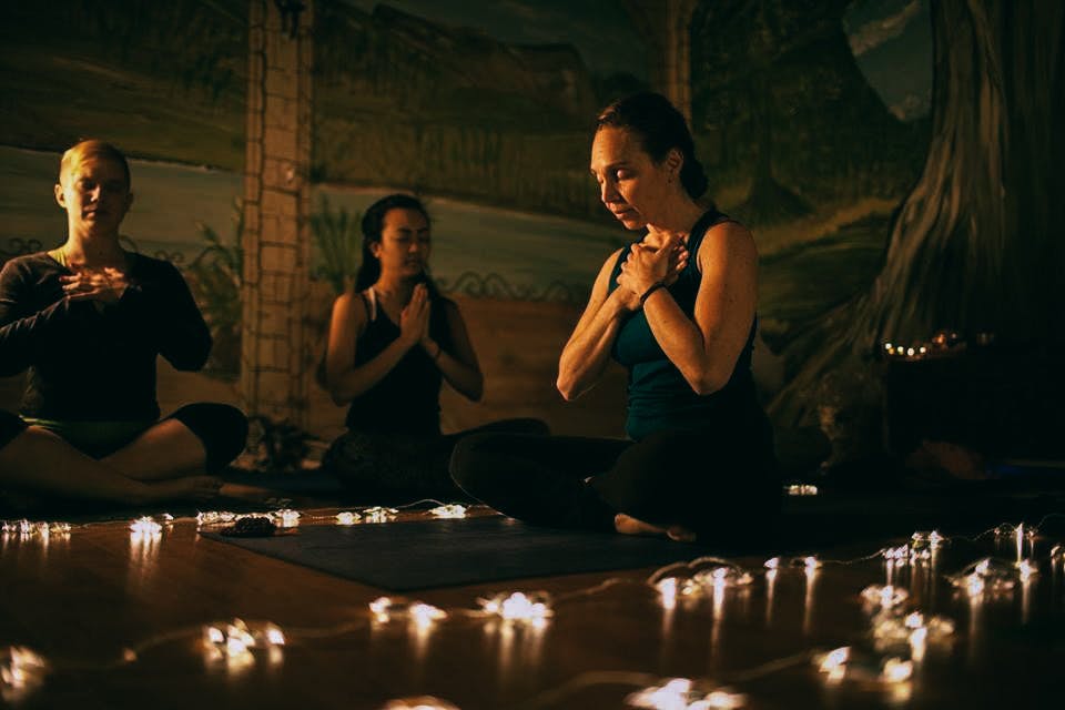 Teacher beginning a Ganja Yoga Class