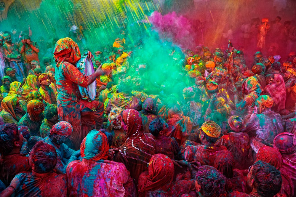 Holi Festival Celebrations where people sing bhajans of Radha and Lord Krishna on in Mathura, India