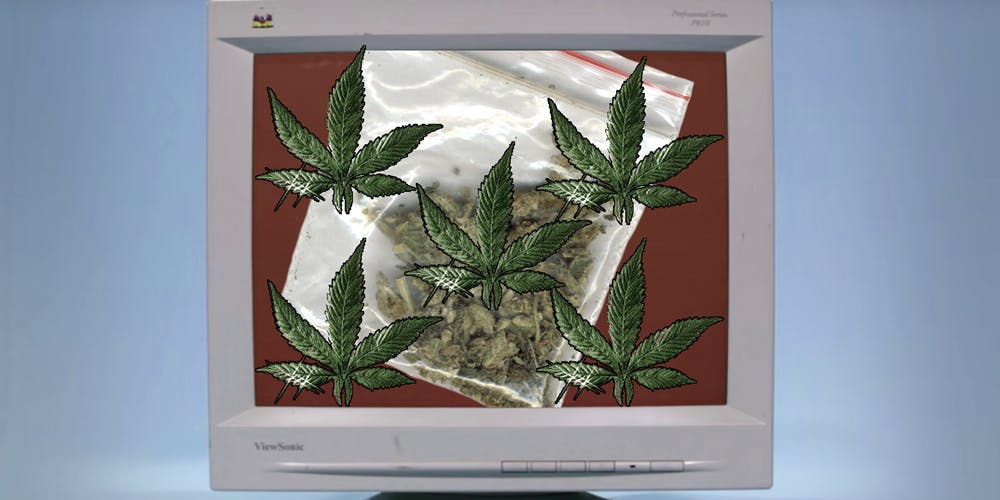 90's computer with a bag of marijuana and pot leafs on it