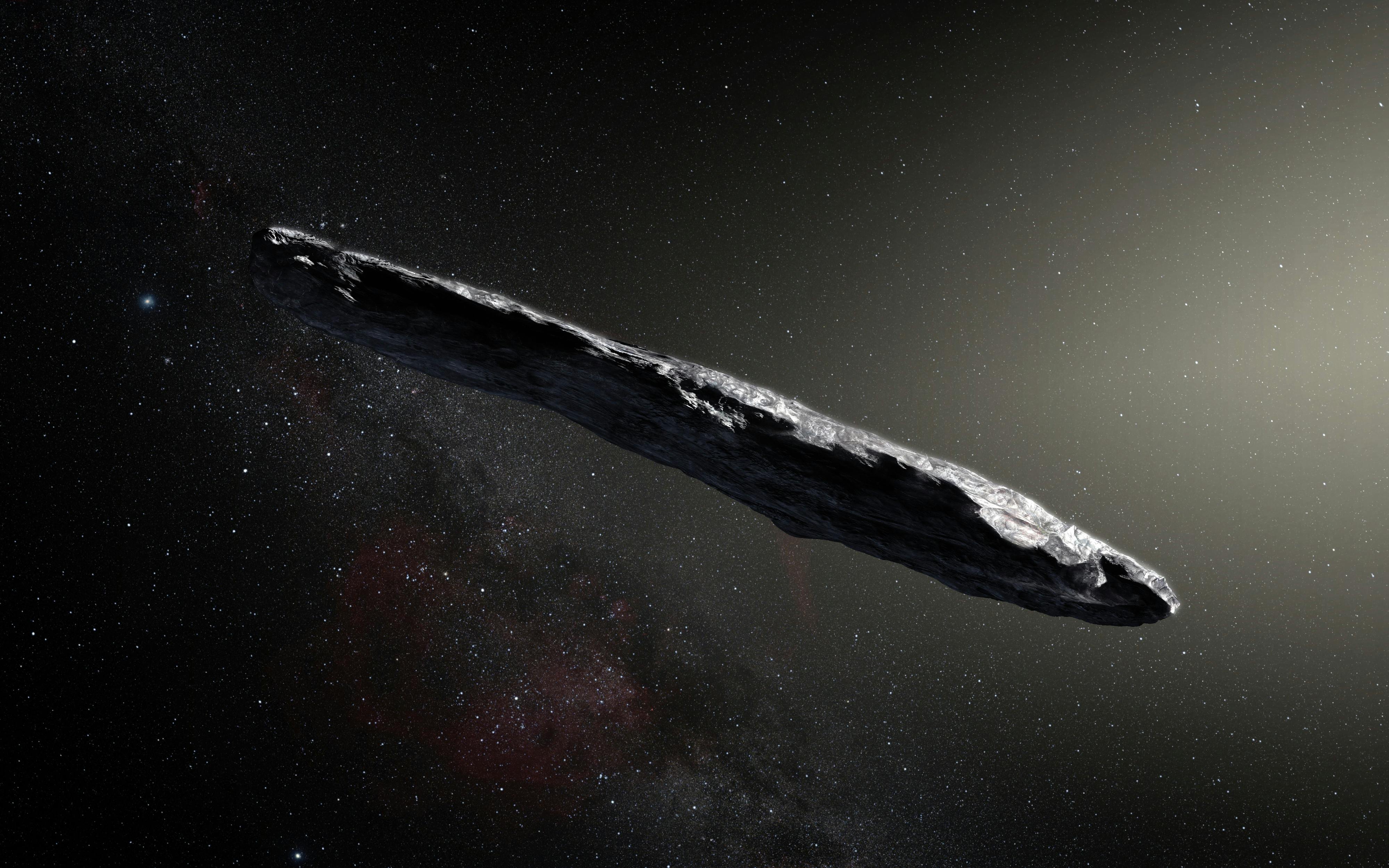 a dark red highly-elongated metallic or rocky object, about 400 metres long,