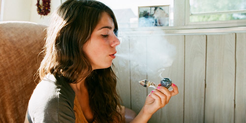 Woman smoking Cannabis