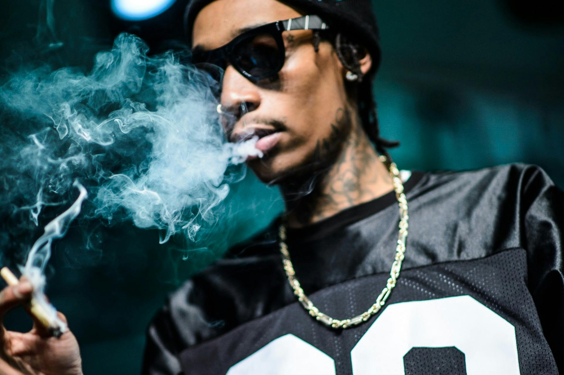 Wiz Khalifa kicks Shiggy from dressing room for coughing fit during their smoke sesh.