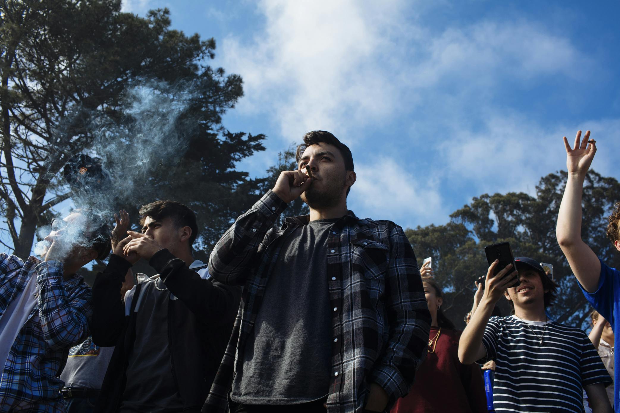 man smokes joint at The Origin place of 420