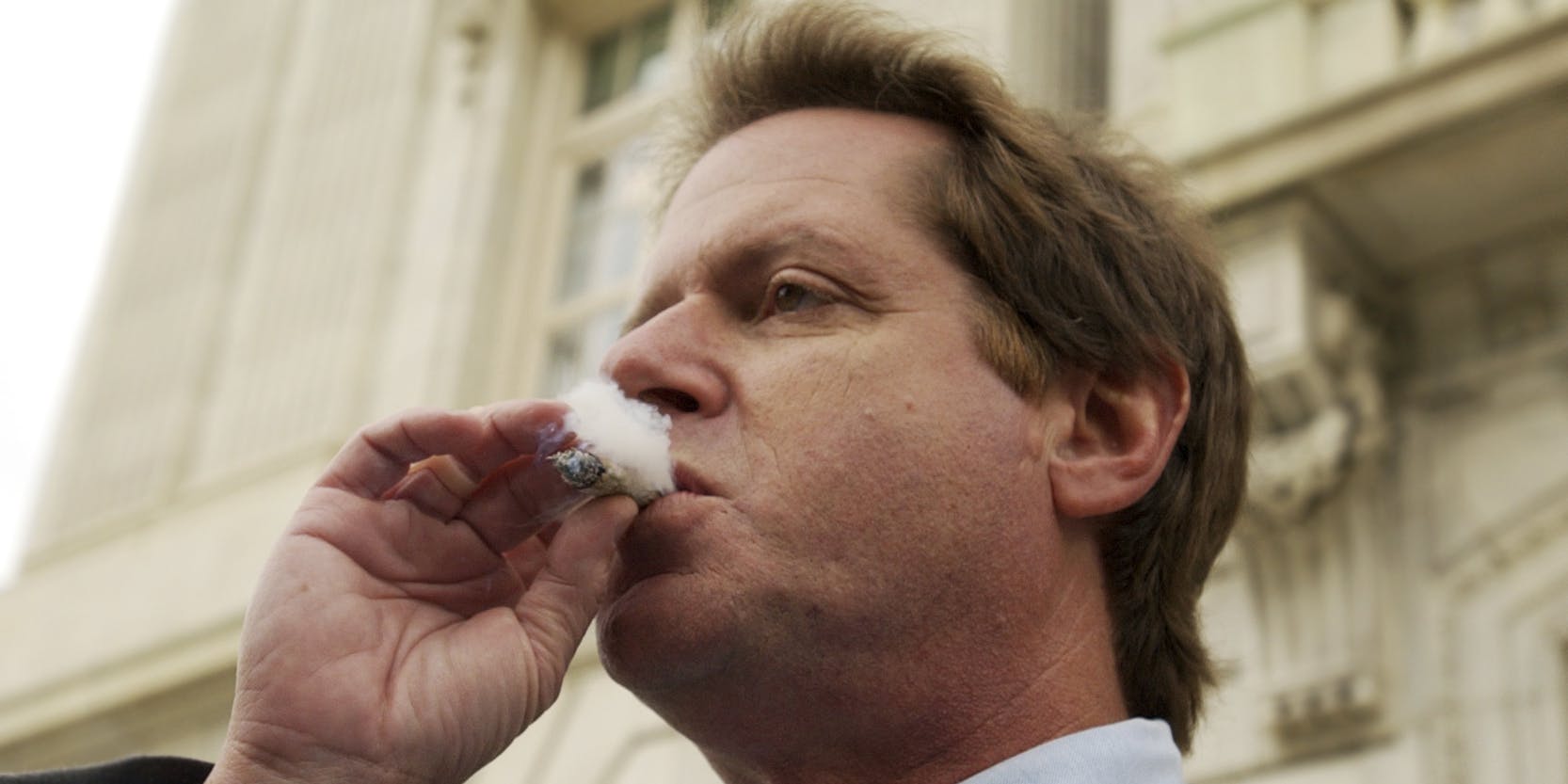 Floridian Medical Marijuana Irvin Rosenfeld smoke a joint on the steps of the Florida capitol building
