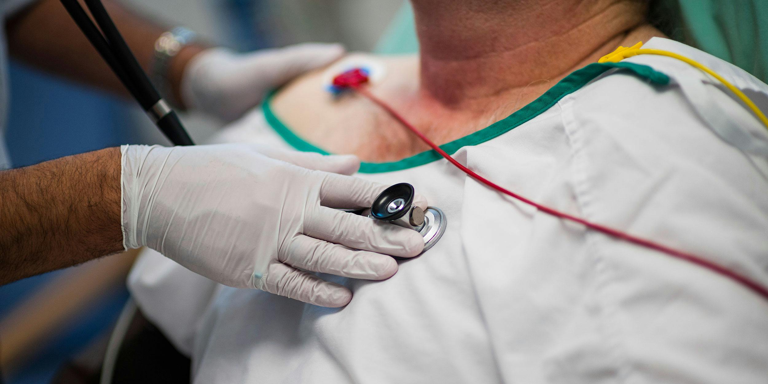 A doctor using a stethoscope on a patient. A CBC report says edibles have caused a spike in emergency room visits, and poor public education is partly to blame.