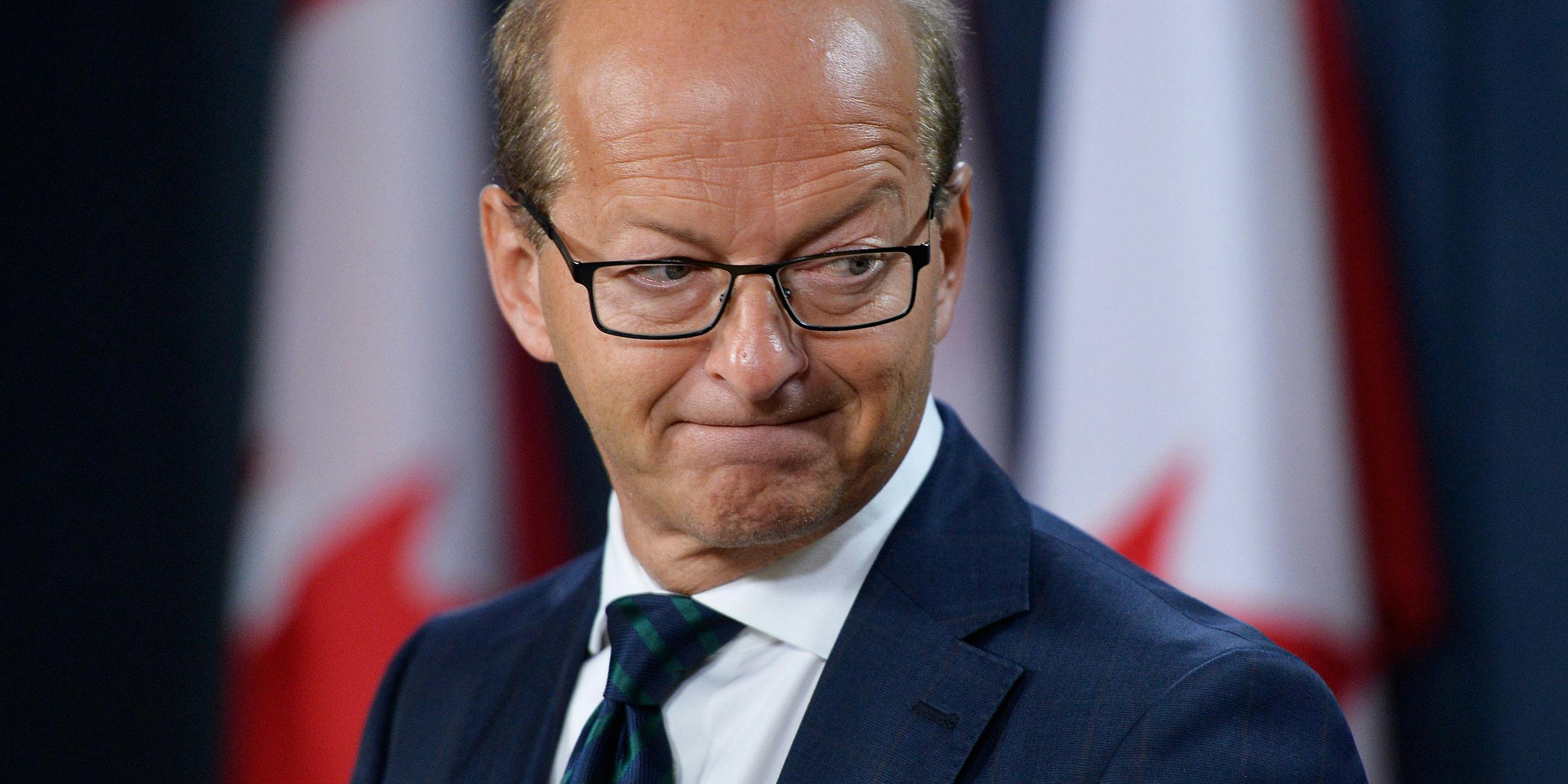Former leader of the Opposition in the Senate Sen. Claude Carignan holds a press conference in Ottawa on Monday, October 3, 2016. (Photo by Matthew Usherwood)