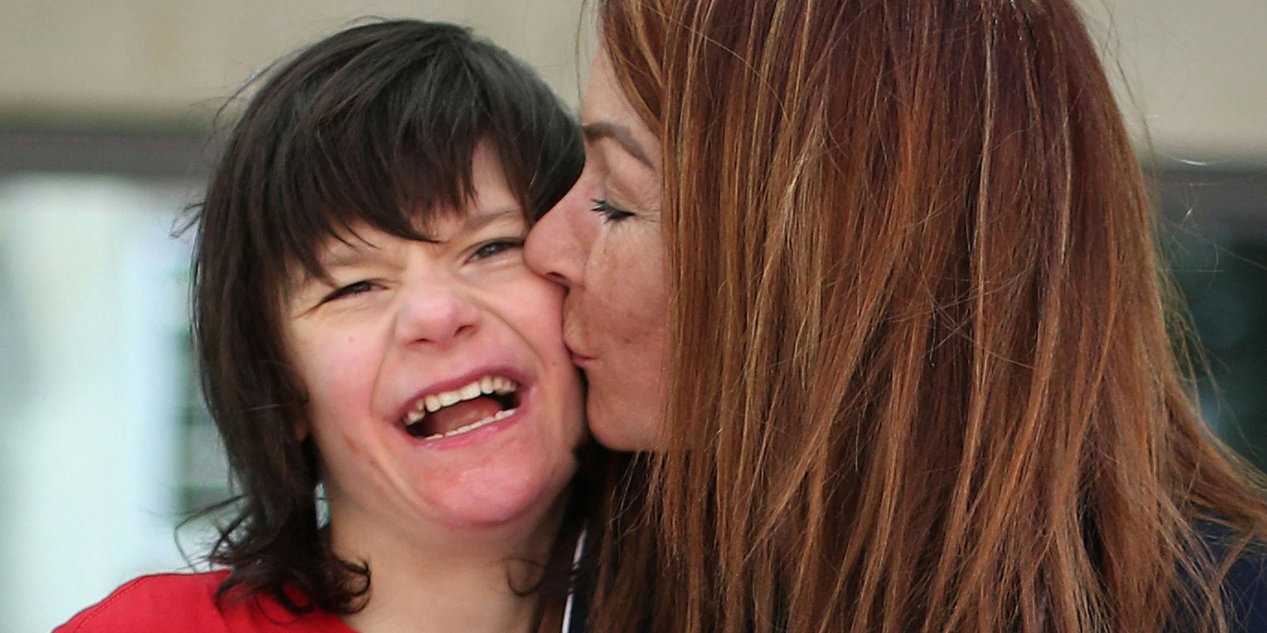 Charlotte Caldwell and her son Billy outside the Home Office in London