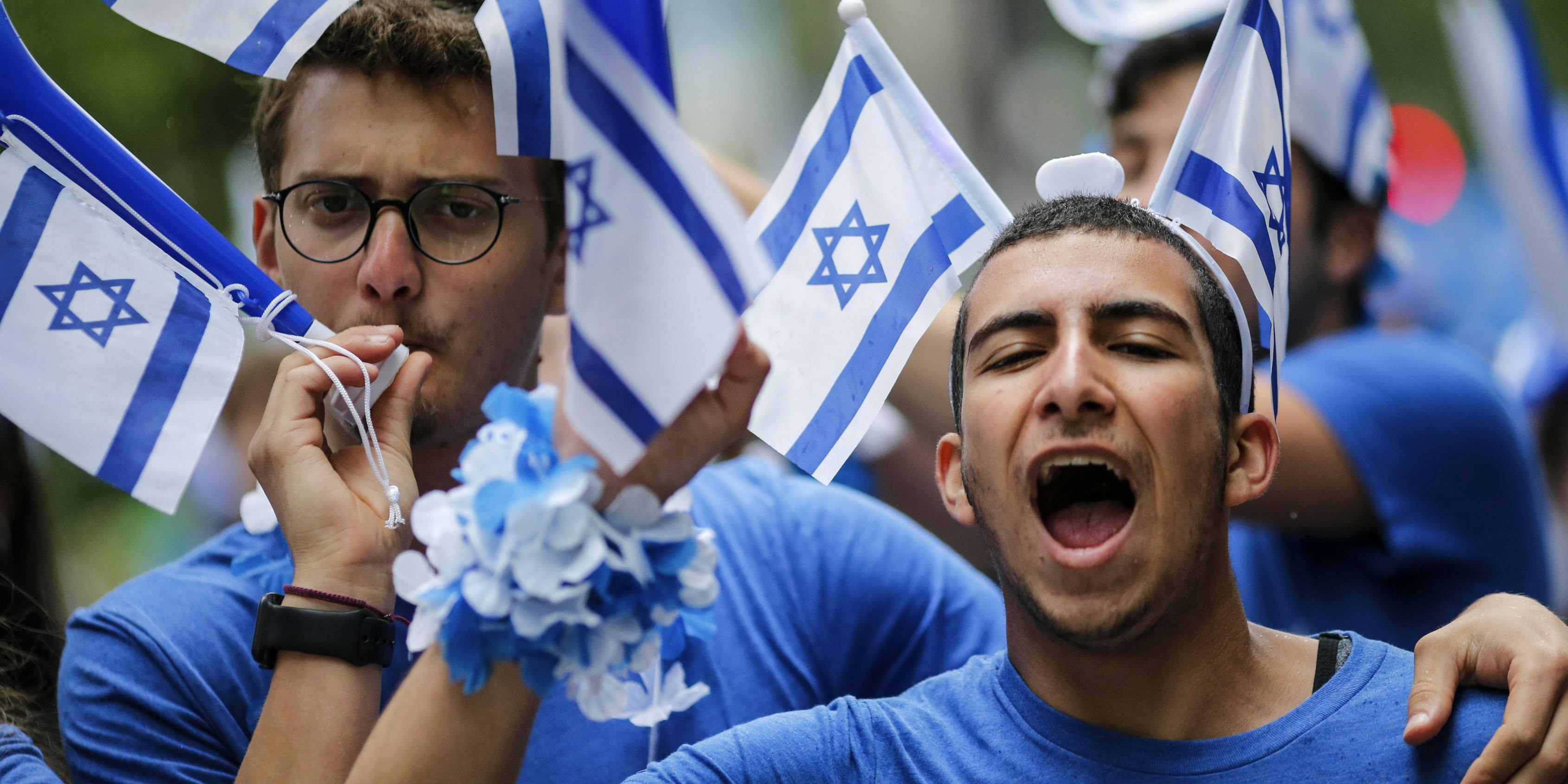 NEW YORK, NY - JUNE 03: People participate in the annual Celebrate Israel Parade on June 3, 2018 in New York City. Security will be tight for the parade which marks the 70th anniversary of the founding of Israel. (Photo by Kena Betancur/Getty Images)