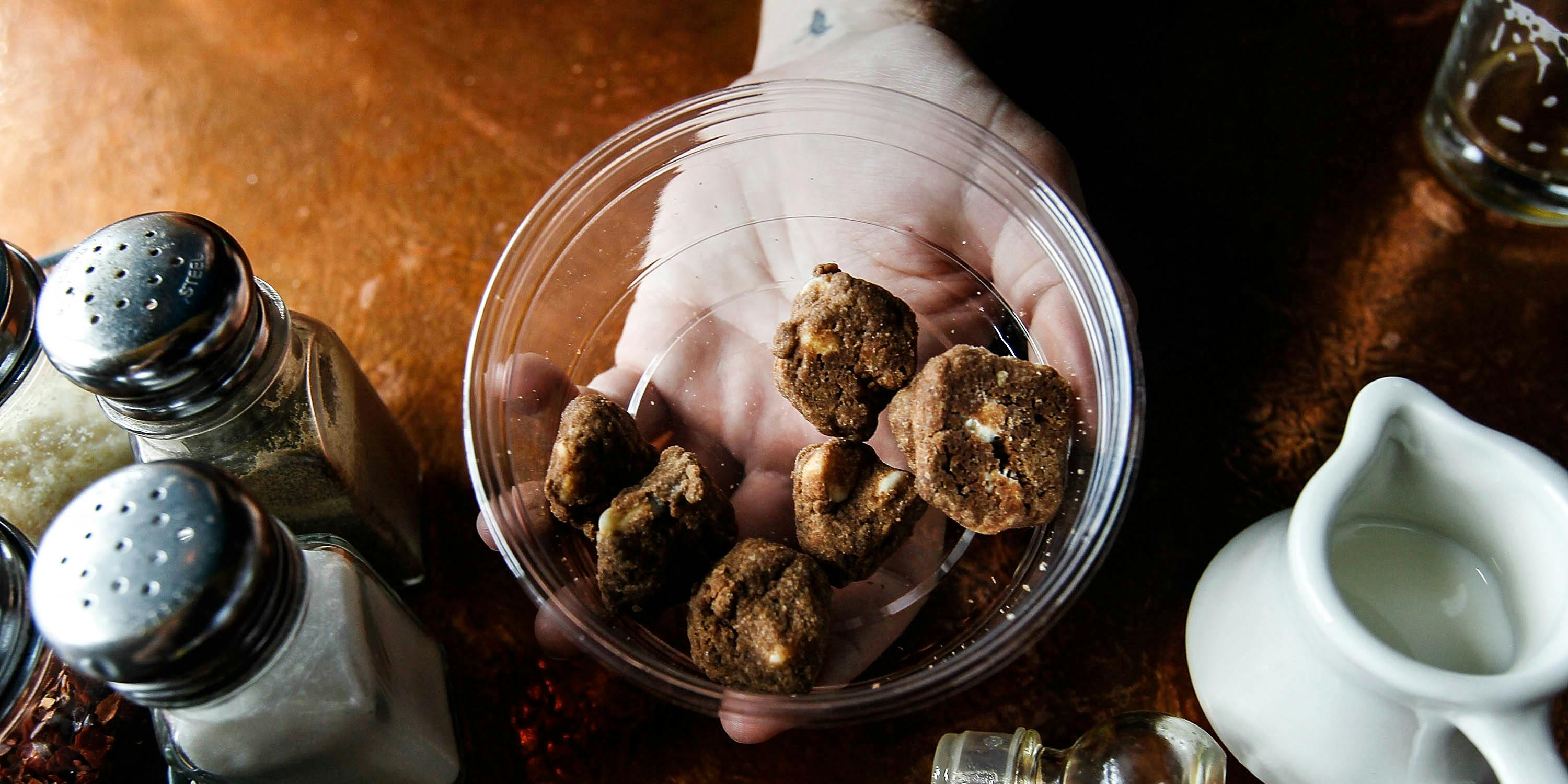 Marijuana-infused cookies called "Medibles" are displayed at the Cannabis Crown 2010 exp. According to a recent report by the CBC, potent edibles paired with poor public education have caused a spike in emergency room visits.