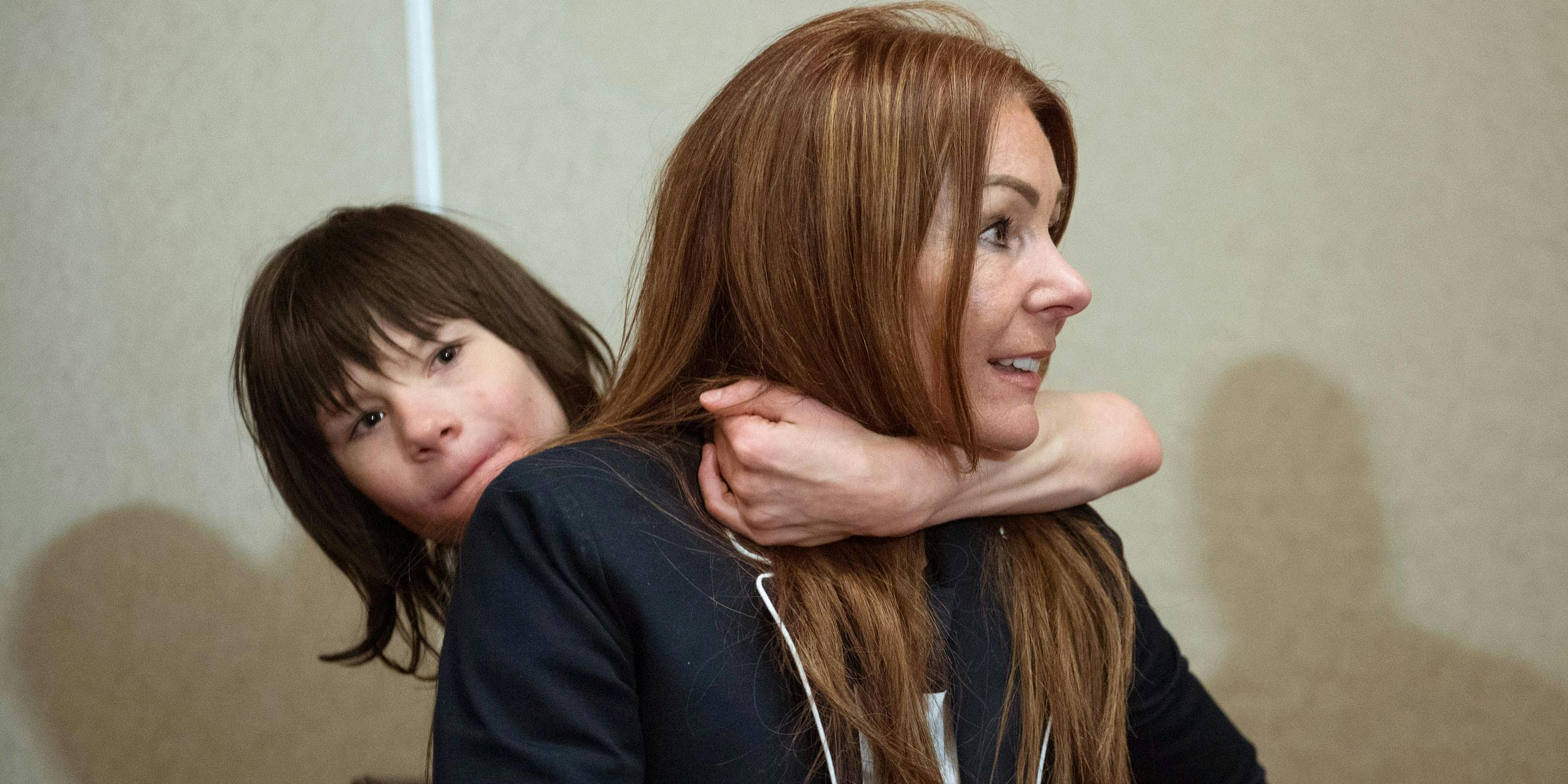 Charlotte Caldwell and her son Billy at Heathrow Airport after having a supply of cannabis oil used to treat his severe epilepsy confiscated on their return from Canada. (Photo by Stefan Rousseau/PA Images via Getty Images)