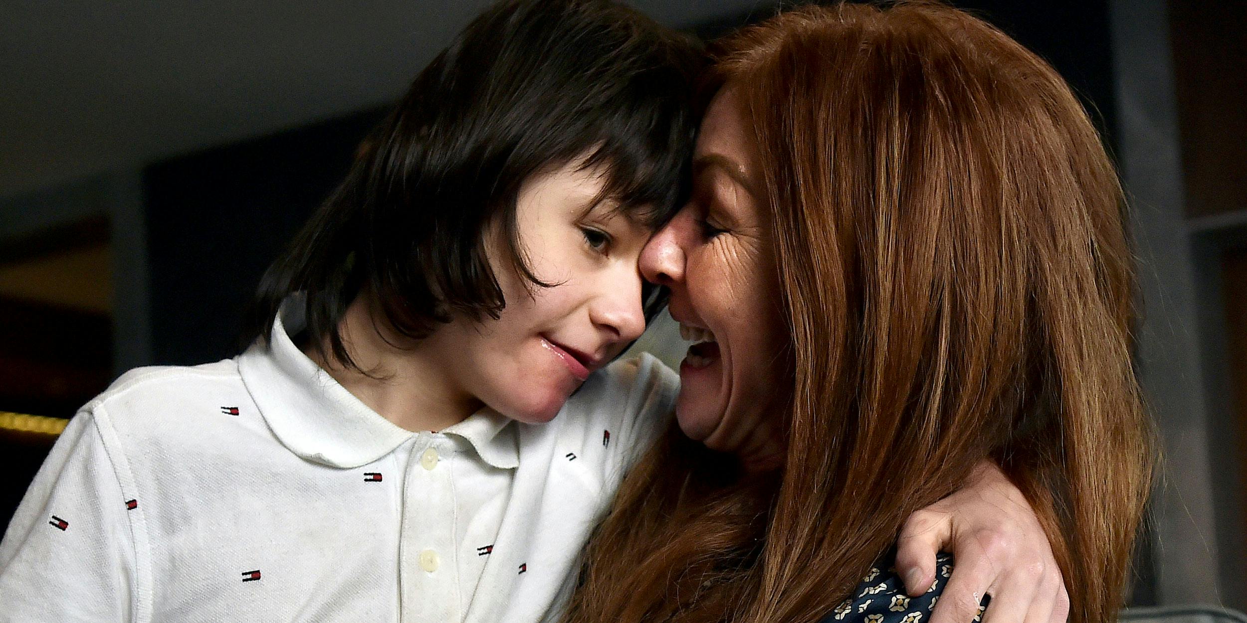 Billy Caldwell and his mother Charlotte as they return to Belfast on July 5, 2018. Billy's story about CBD for epilepsy spurred a debate in the UK about whether medical cannabis should be legal for prescription. (Photo by Charles McQuillan/Getty Images)