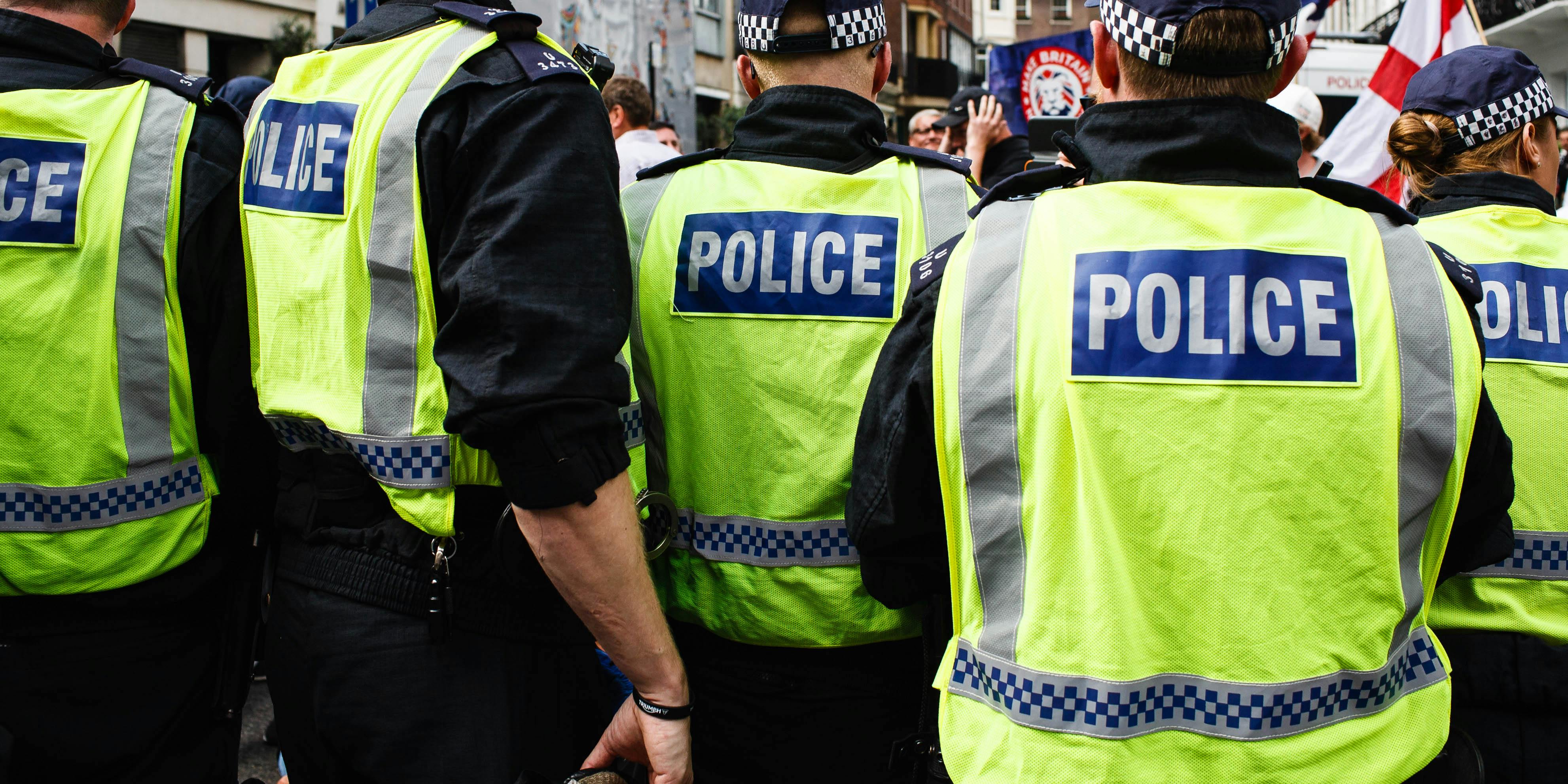 UK police officers contain a demonstration. Police Officers have not been cracking down on UK cannabis clubs because they have other priorities