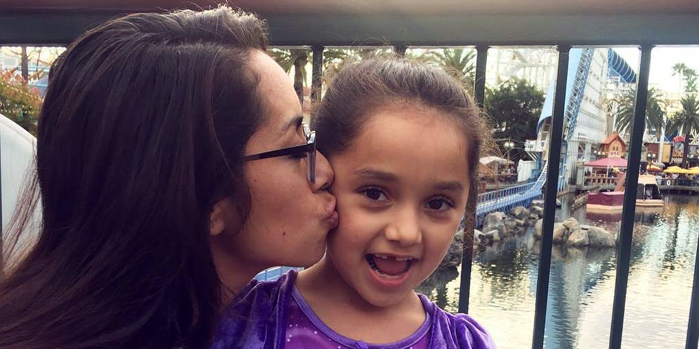 Maria Selva and her daughter Ali, during a trip to Disneyland in 2017. Maria is now suing after losing custody of her daughter for treating her seizures with CBD.