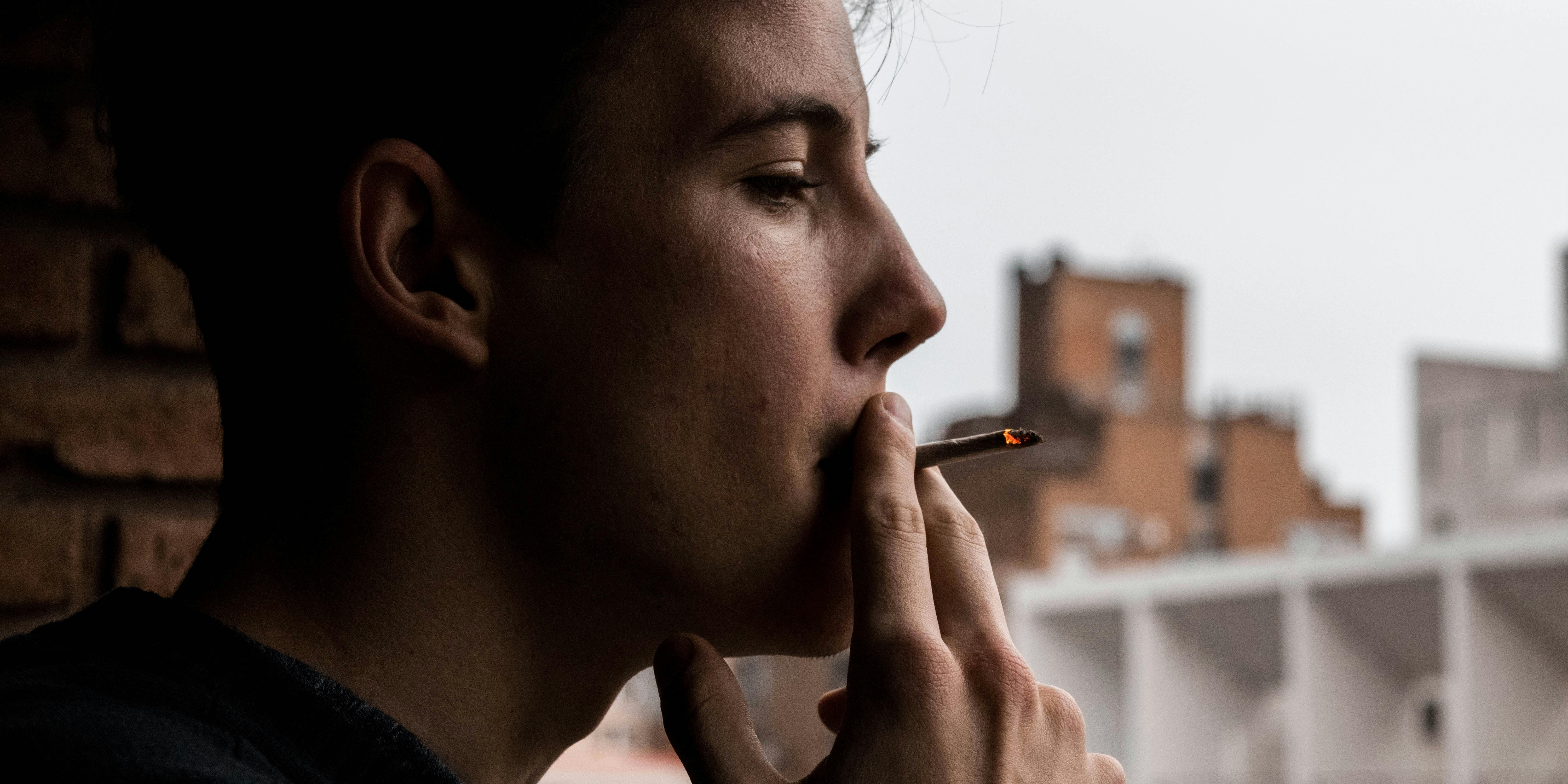 Synthetic Cannabis Study Leads to Misleading Coverage About the Risks of Weed. Here, a man is shown smoking a joint