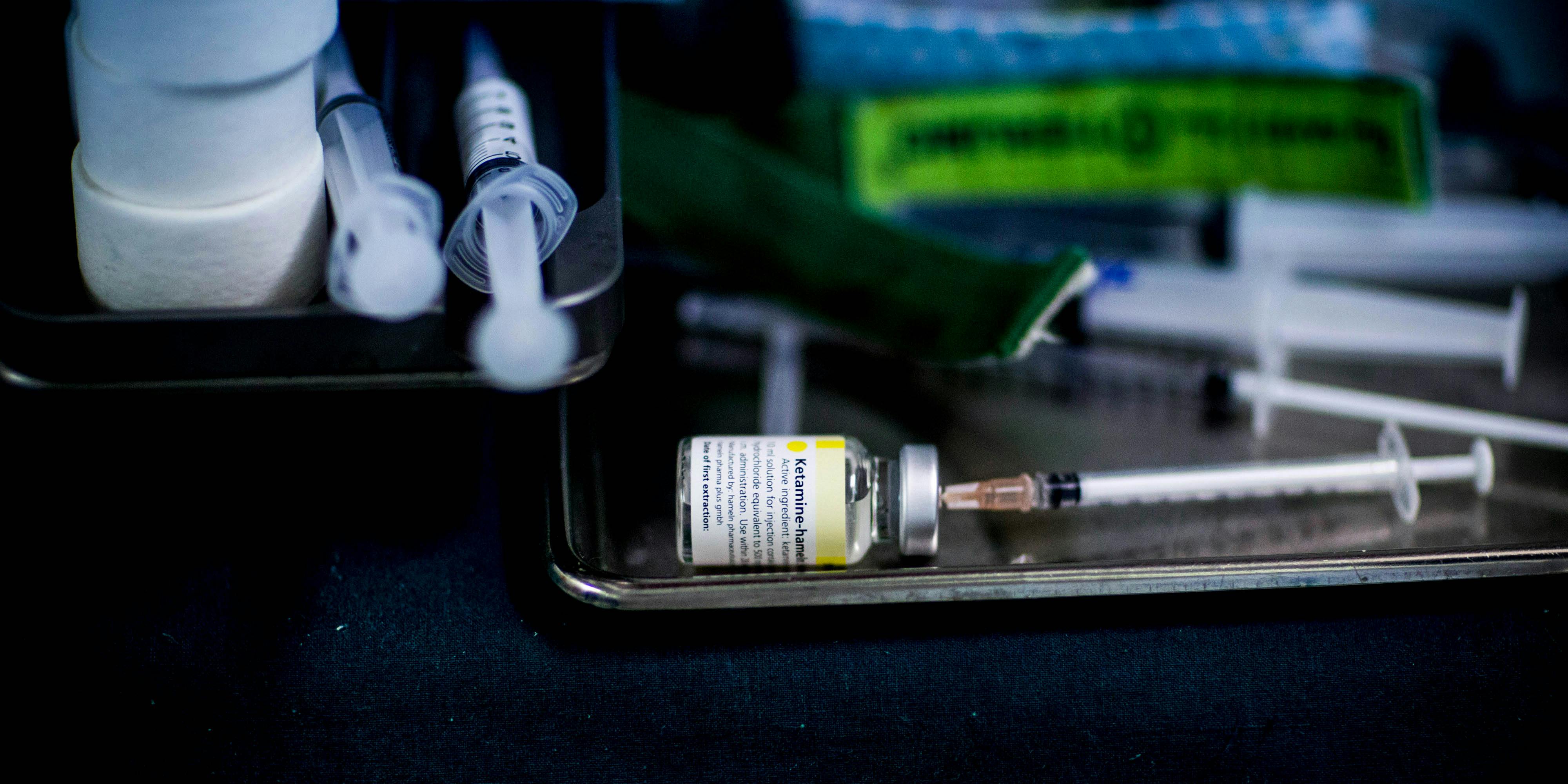 A syringe sits in a bottle of Ketamine inside the operating room at the Pratunam Polyclinic in Bangkok, Thailand, on Friday, Oct. 2, 2015. Ketamine for Depression is growing in popularity in the U.S. (Photo by Brent Lewin/Bloomberg via Getty Images)
