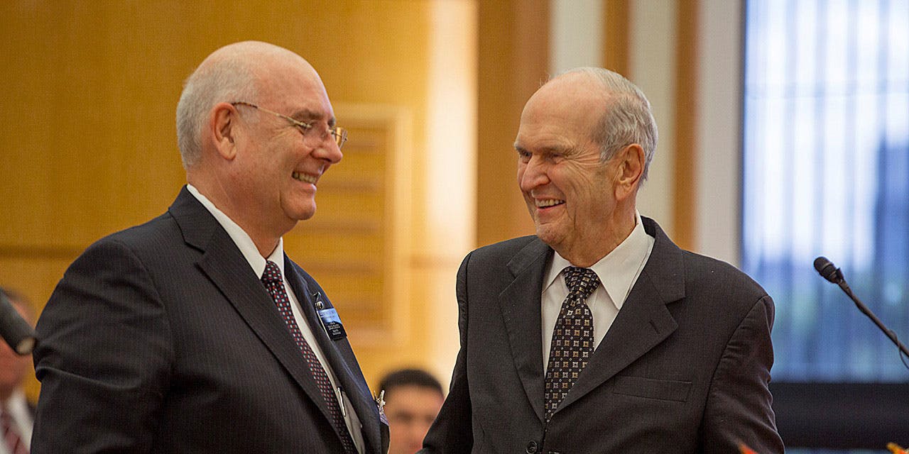 Elder Nelson speaks with Recife Mission President Rubens C. Lanius during a priesthood leadership meeting. The Mormon Church supports cannabis legalization in Utah, but not the bill that will go before voters in November.
