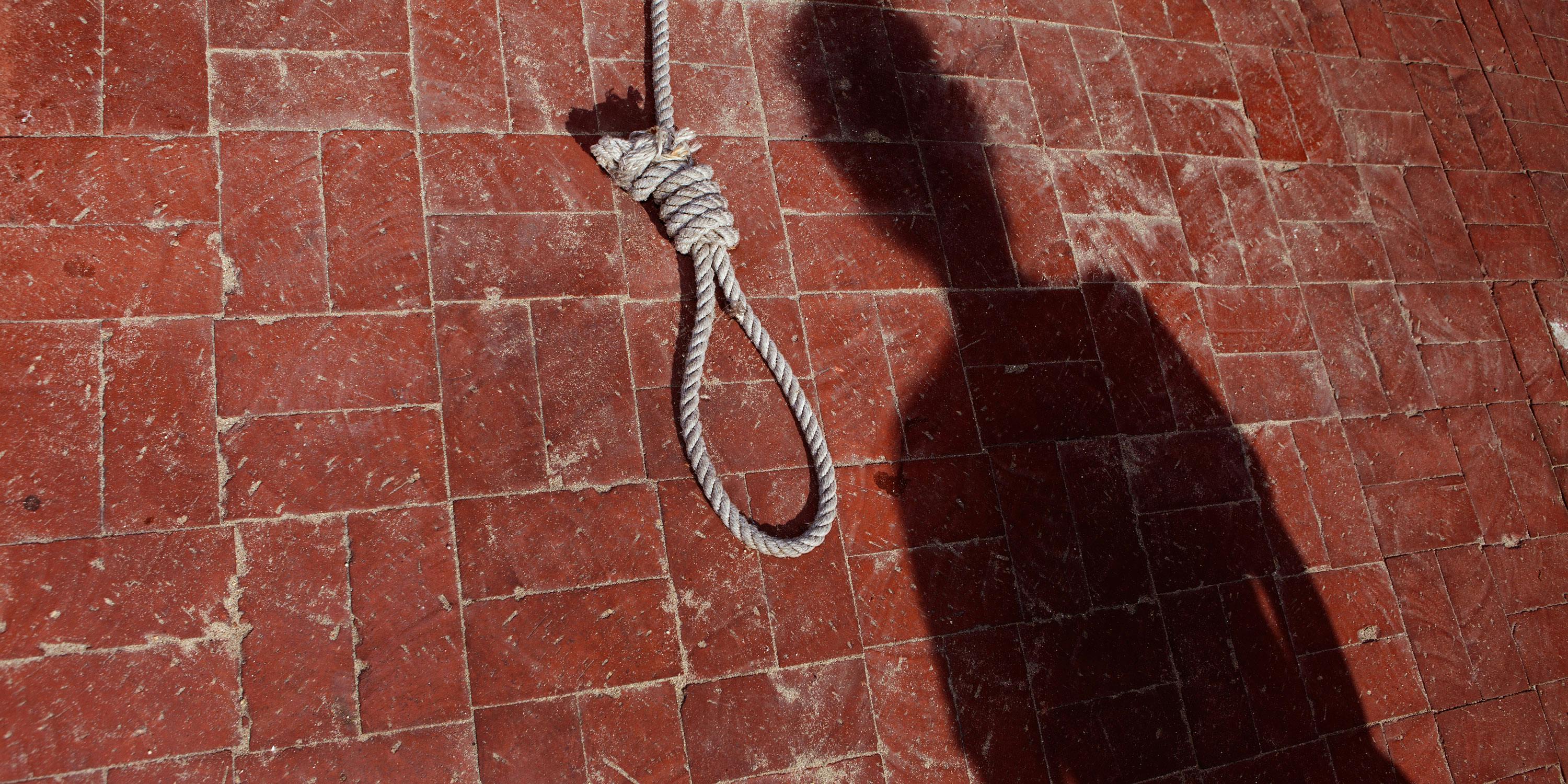 Malaysian Man Sentenced to Death for Cannabis Oil Given to Patients. Here, a shadow of a man is shown beside a noose