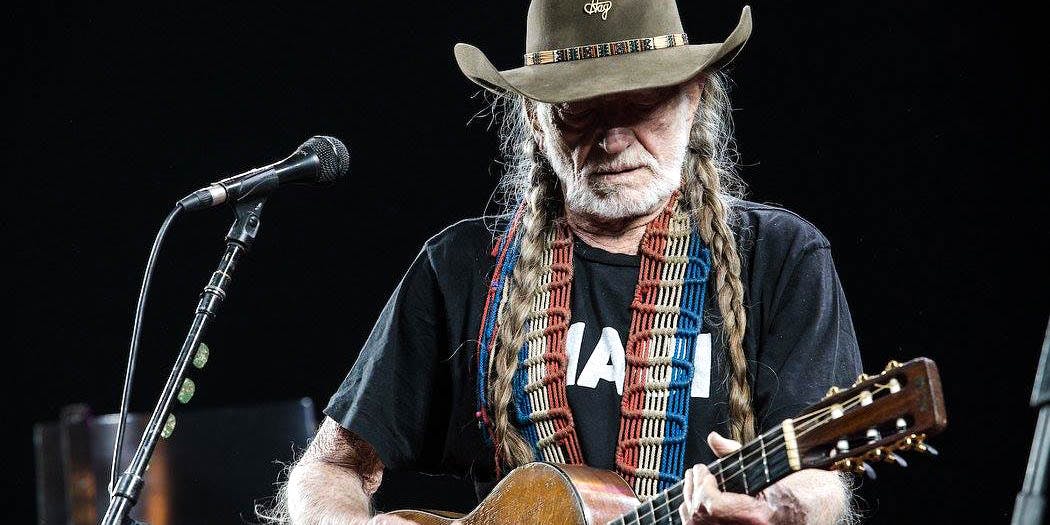 Willie Nelson performs onstage. Willie Nelson recently appeared on Stephen Colbert's talk show, where he listed the people he would smoke up with.