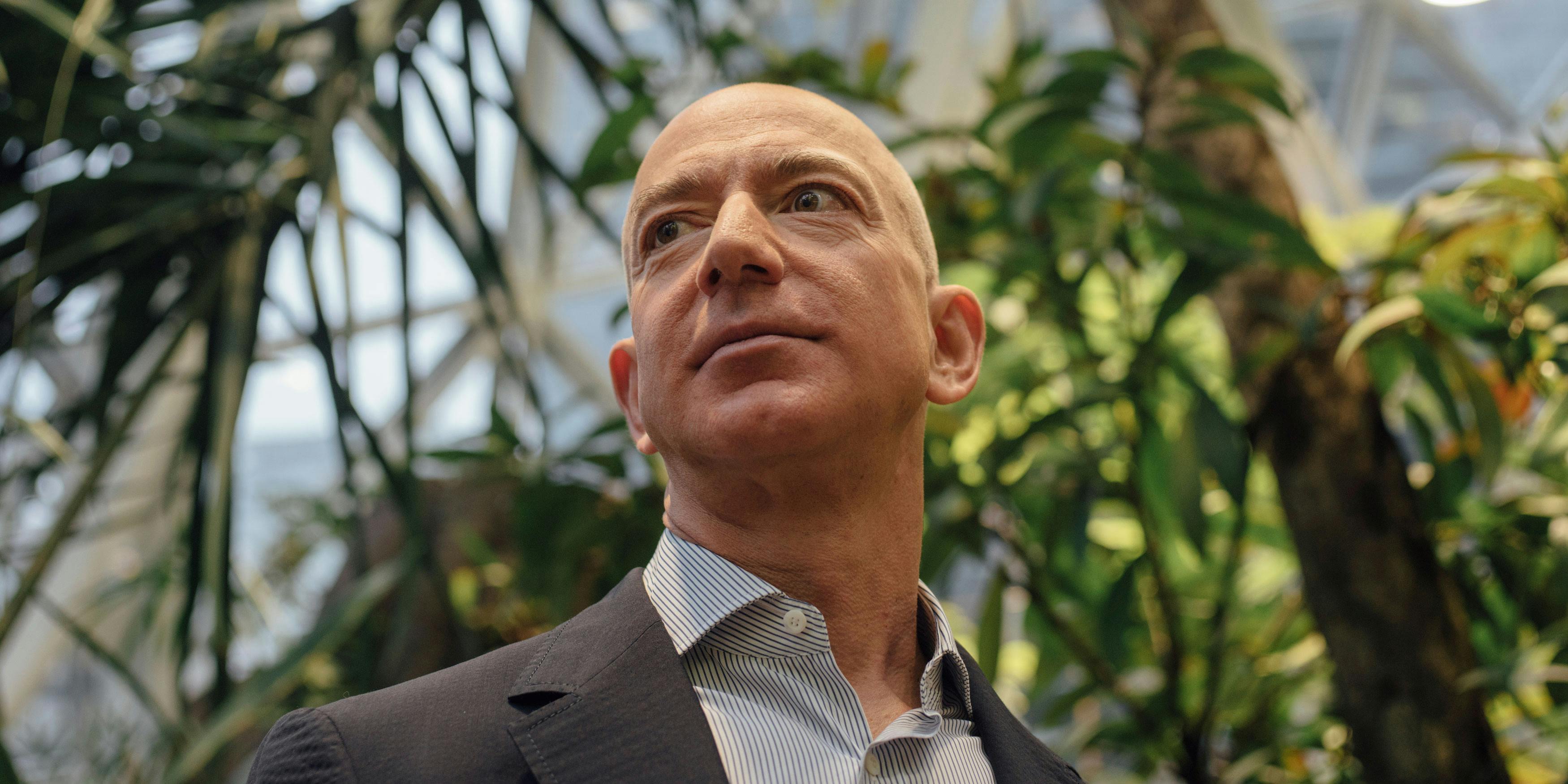 Amazon is donating money to NORML to legalize weed. Here, CEO and Founder Jeff Bezos is taken on a tour of the plants around The Spheres during the grand opening at the Amazon Spheres in Seattle, Washington on January 29, 2018.