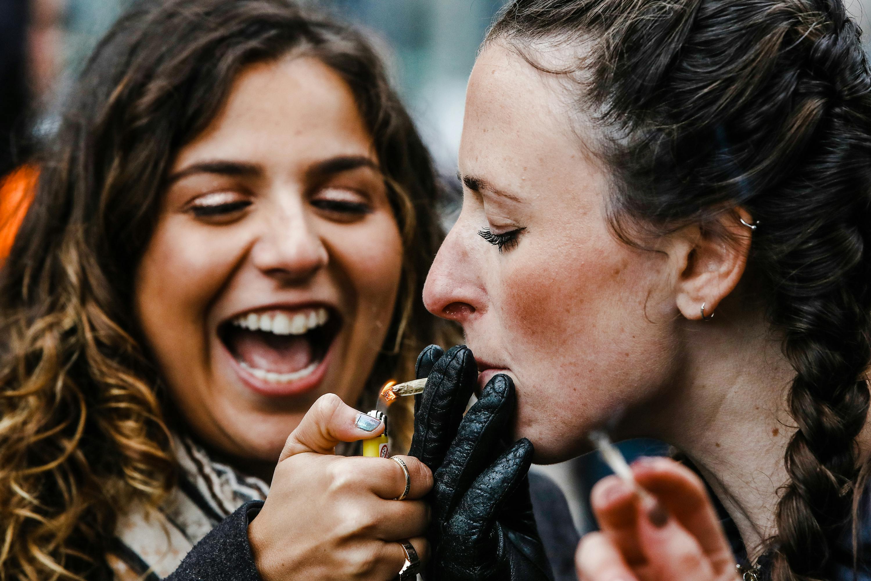 Wondering how to find 420 friends in an illegal state? Read Herb's guide. Here, two girls are shown lighting up together