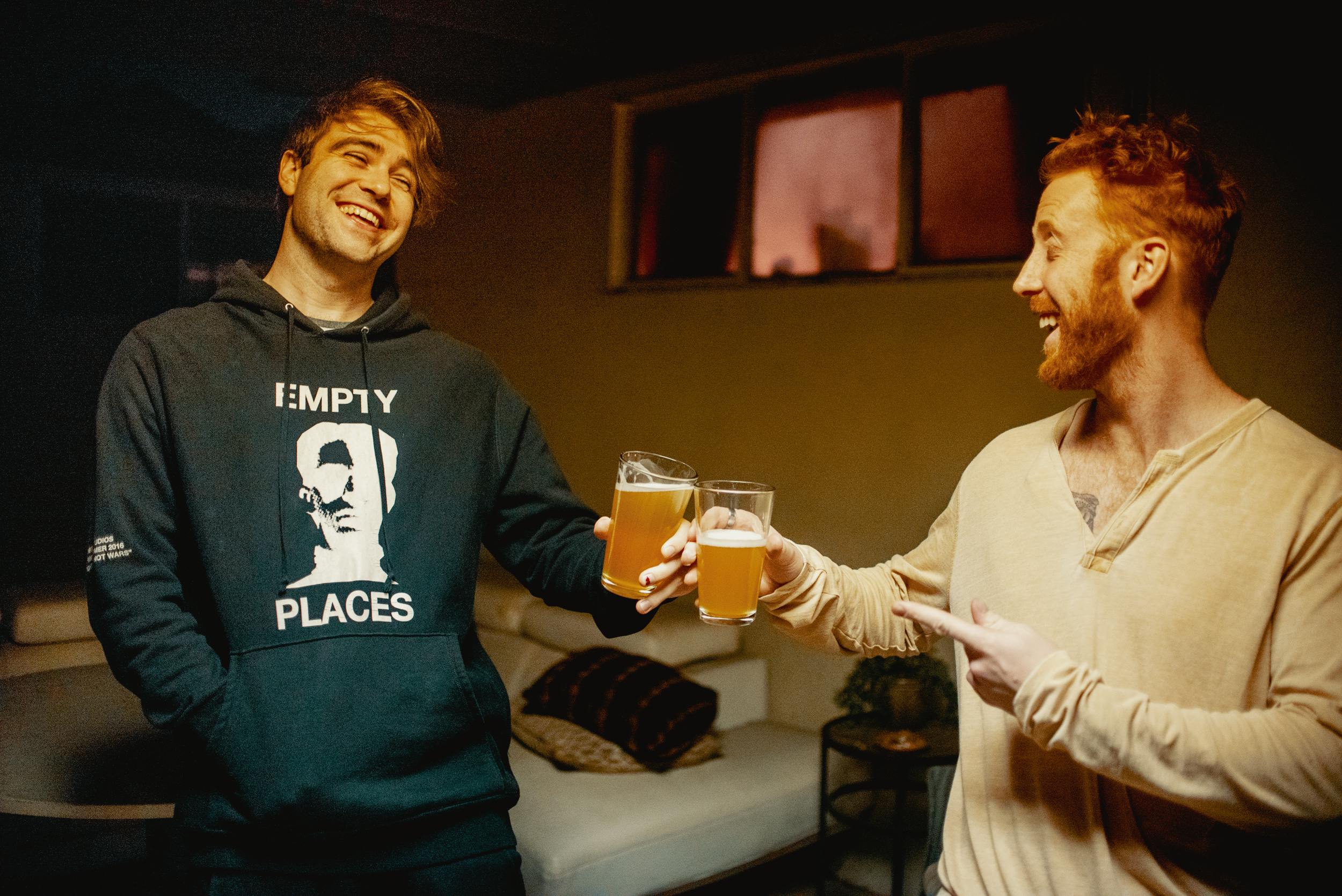 Two men enjoy some of the best weed beer