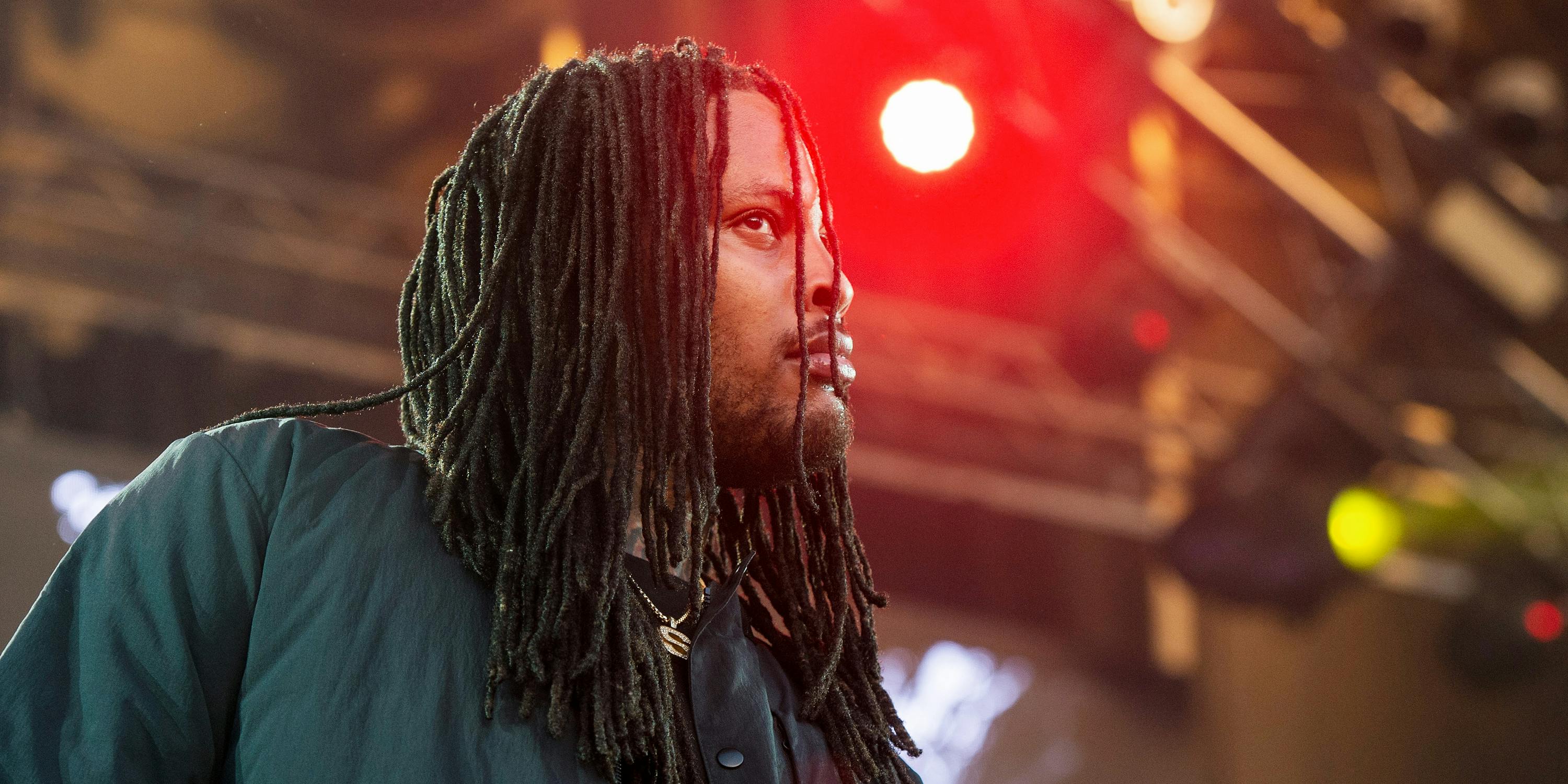 Waka Flocka performs onstage. The rapper recently fired Seth Rogen as his professional joint roller.