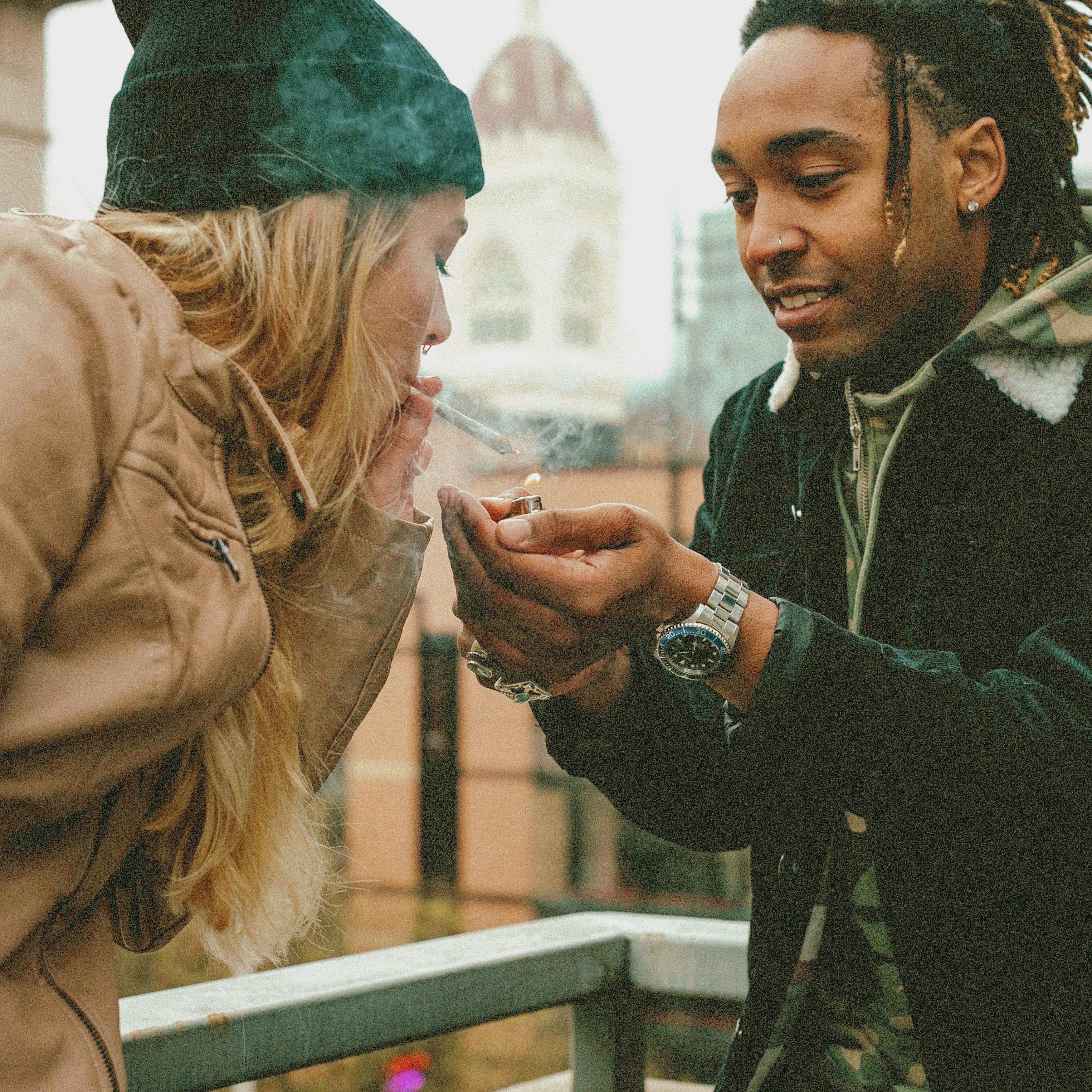 Cannabis affects everyone differently: A man lights a joint for a woman