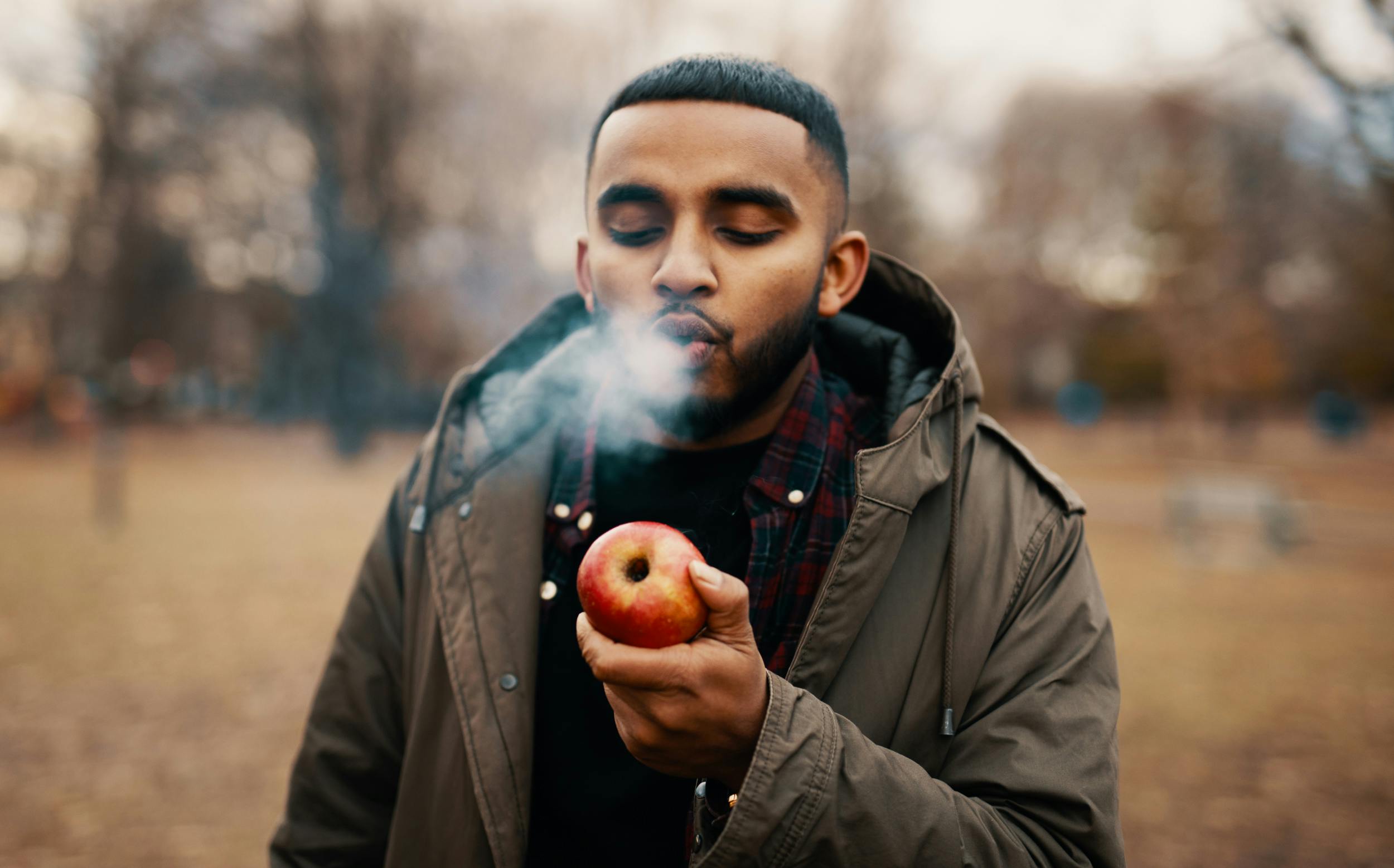 A man learns how to make an apple pipe with our how to make an apple pipe guide