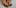 marijuana and fertility: a couple lay on a bed in a state of undress